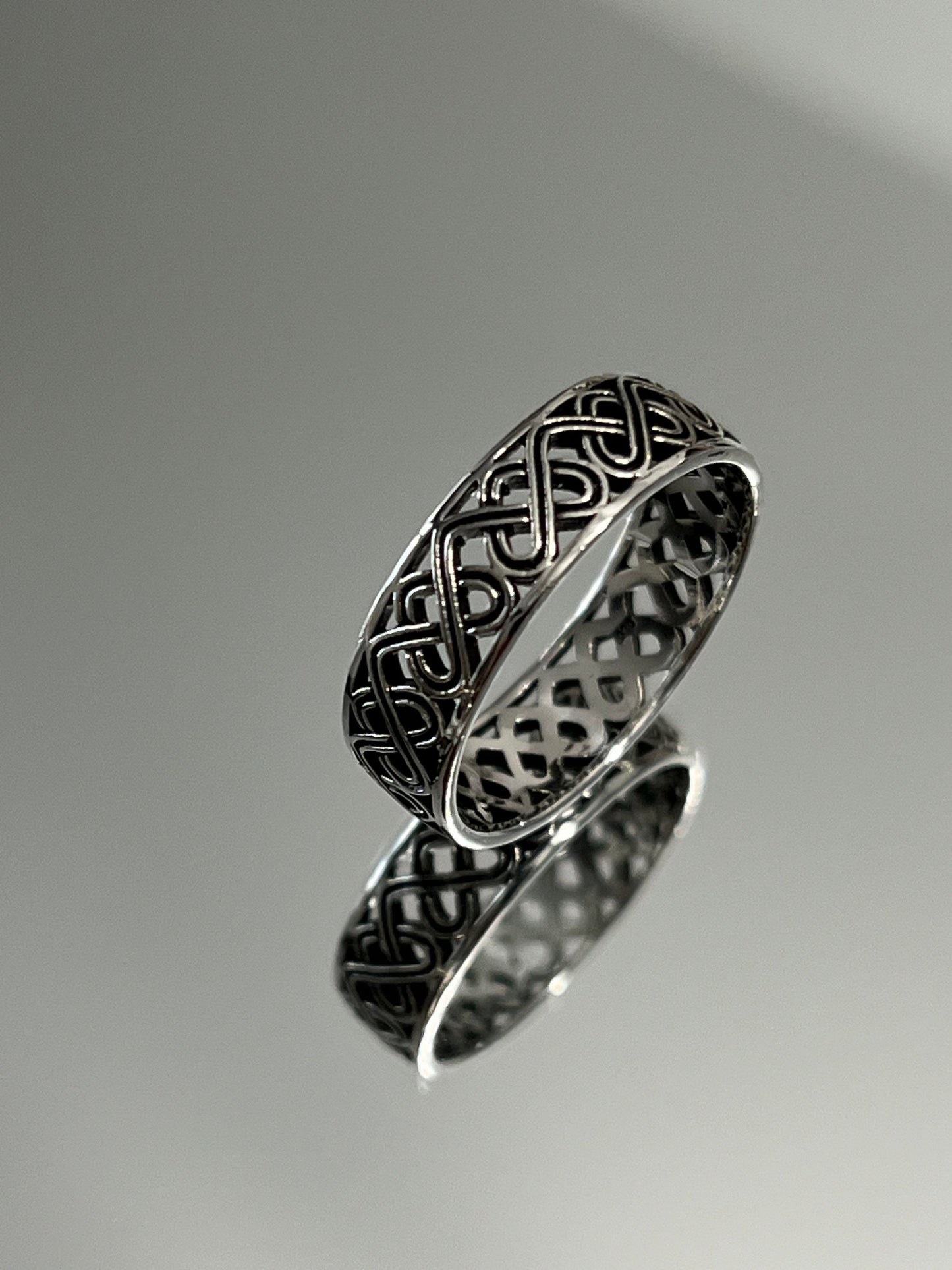 The Celtic Men's Ring is a stunning 7mm sterling silver band, specifically designed for men. This ring makes for an ideal gift.