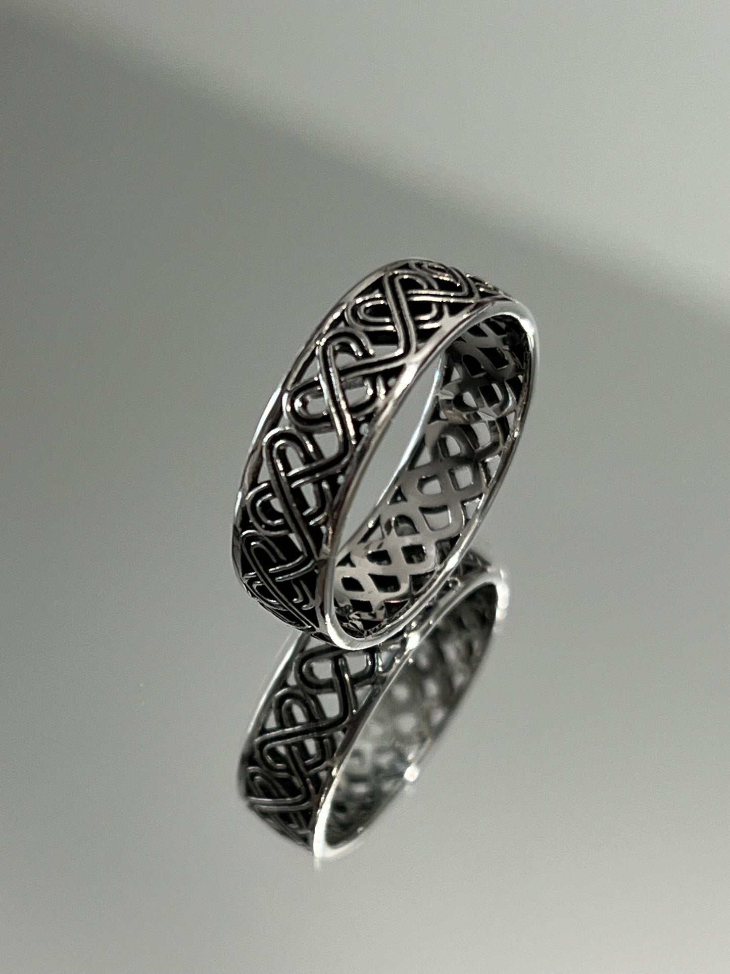 The Celtic Men's Ring is a stunning 7mm sterling silver band, specifically designed for men. This ring makes for an ideal gift.