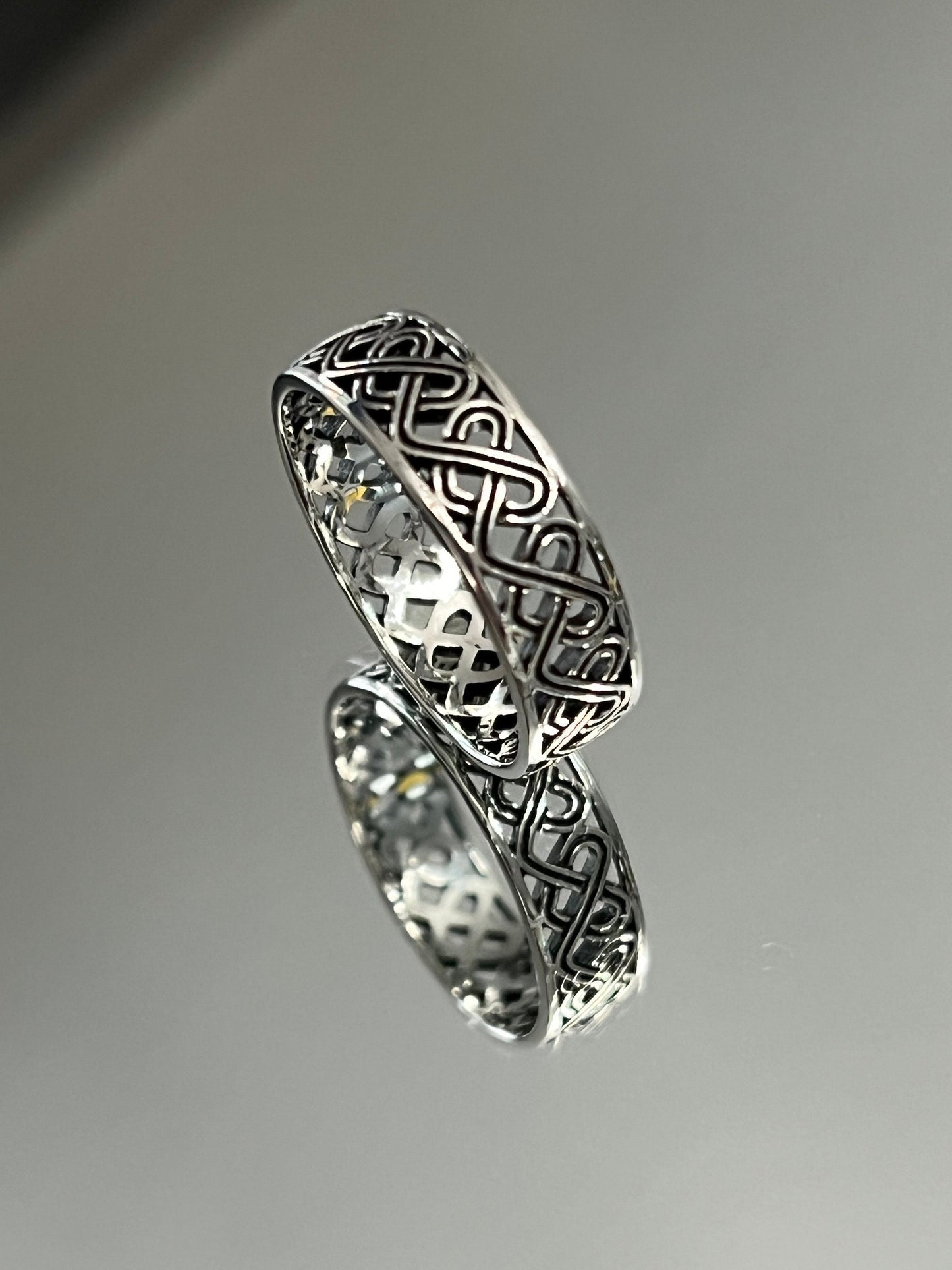 The Celtic Men's Ring is a stunning 7mm sterling silver band, specifically designed for men. This ring makes for an ideal gift.