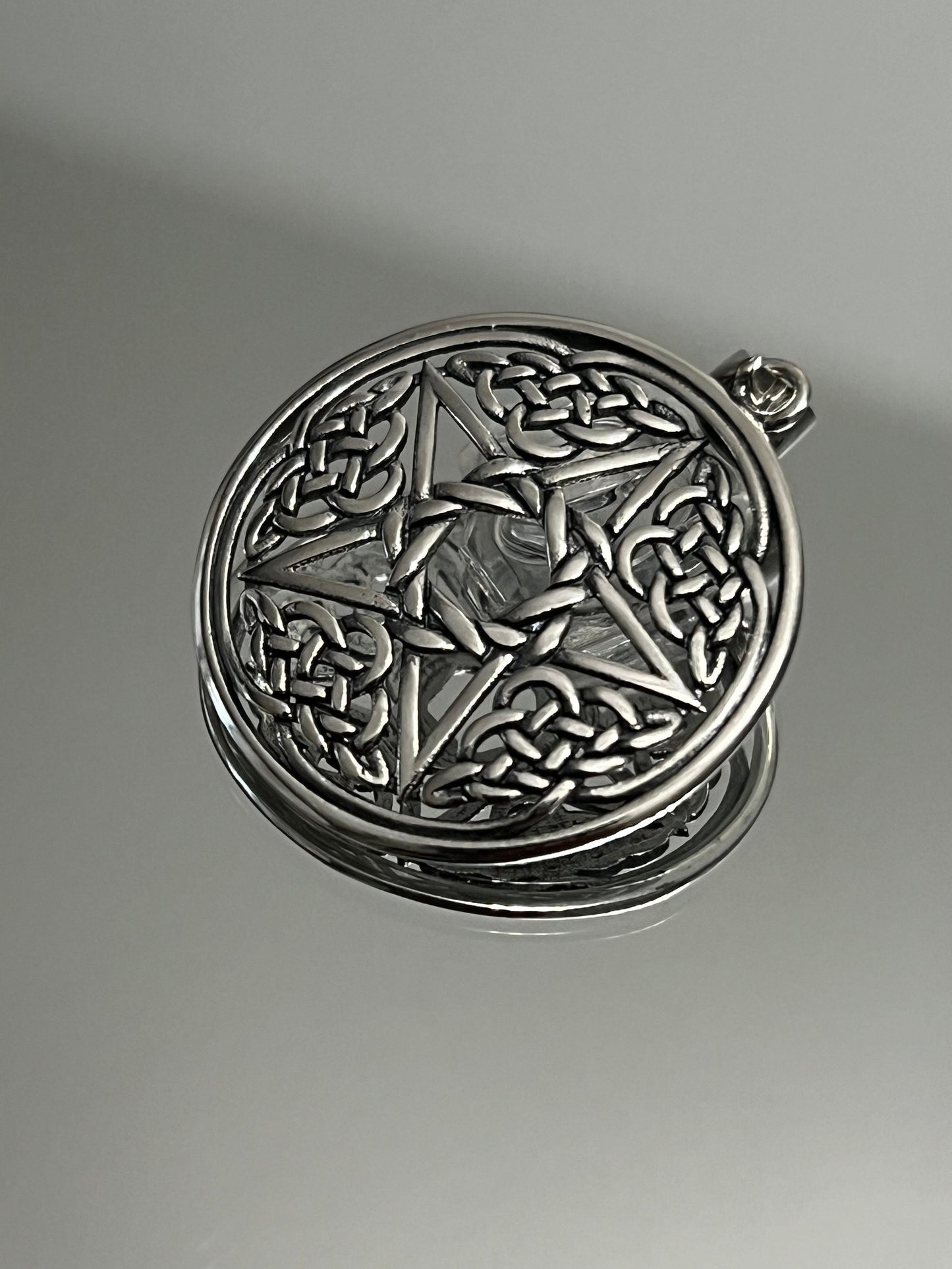 This item is a men's sterling silver Celtic Star Pendant.