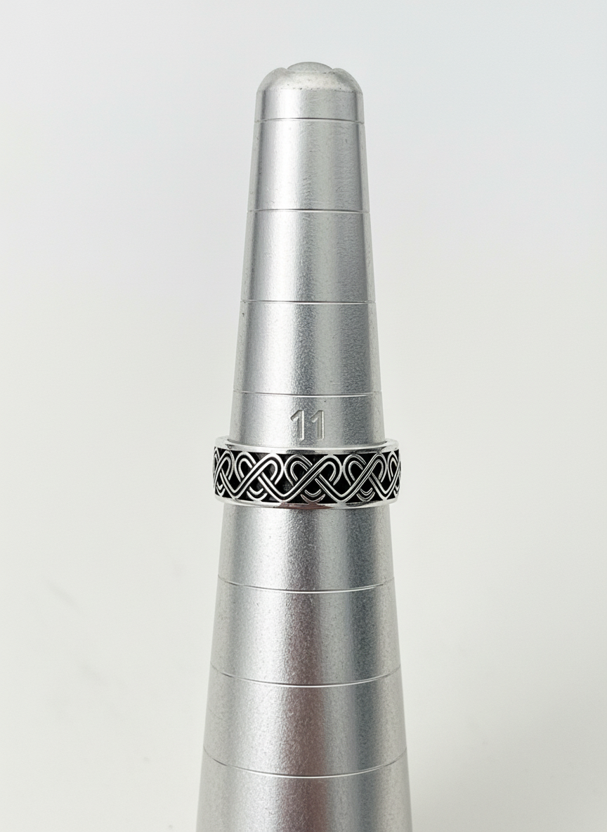 The Celtic Men's Ring is a stunning 7mm sterling silver band, specifically designed for men. This ring makes for an ideal gift.