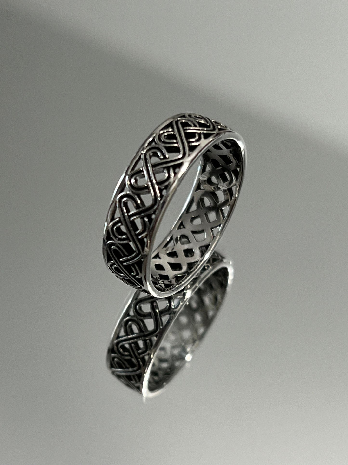 The Celtic Men's Ring is a stunning 7mm sterling silver band, specifically designed for men. This ring makes for an ideal gift.