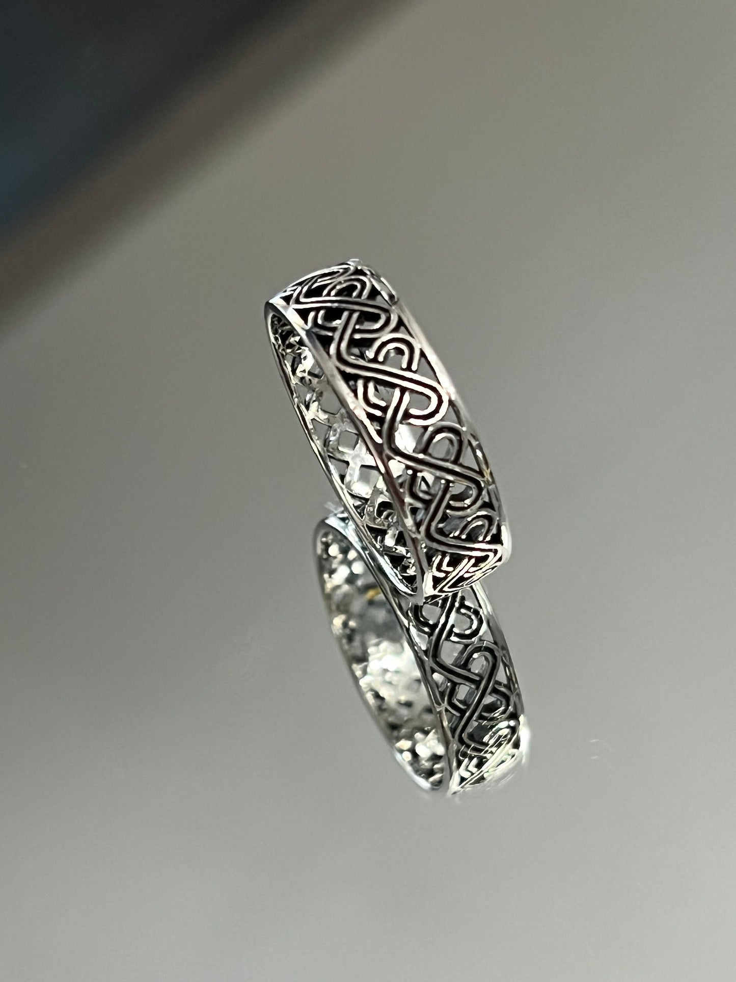 The Celtic Men's Ring is a stunning 7mm sterling silver band, specifically designed for men. This ring makes for an ideal gift.