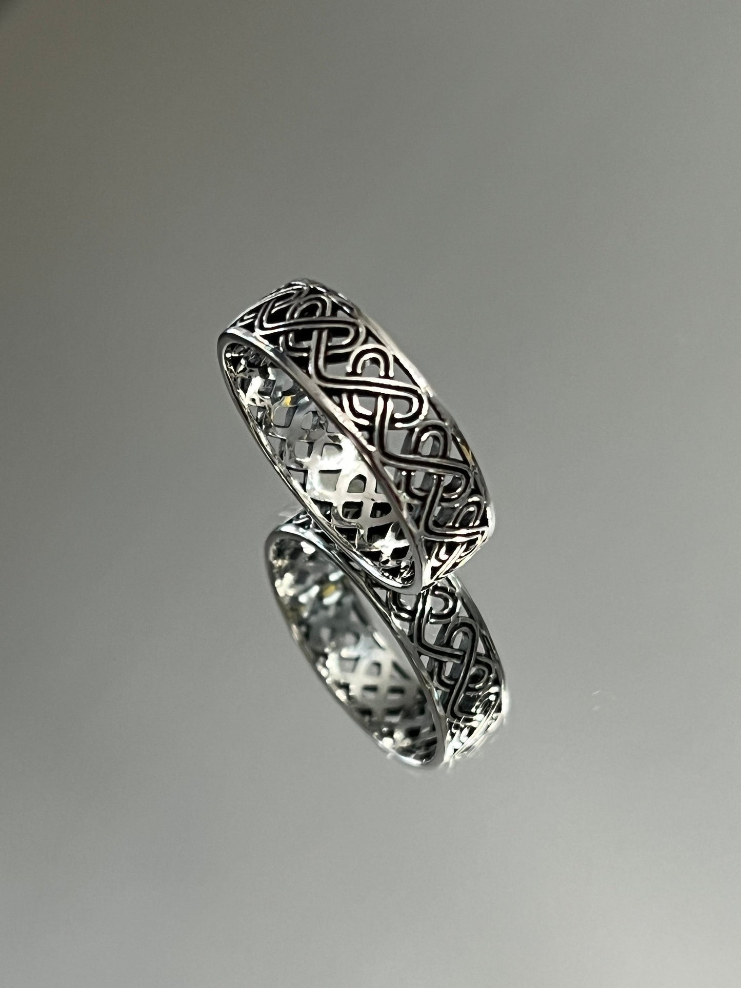 The Celtic Men's Ring is a stunning 7mm sterling silver band, specifically designed for men. This ring makes for an ideal gift.