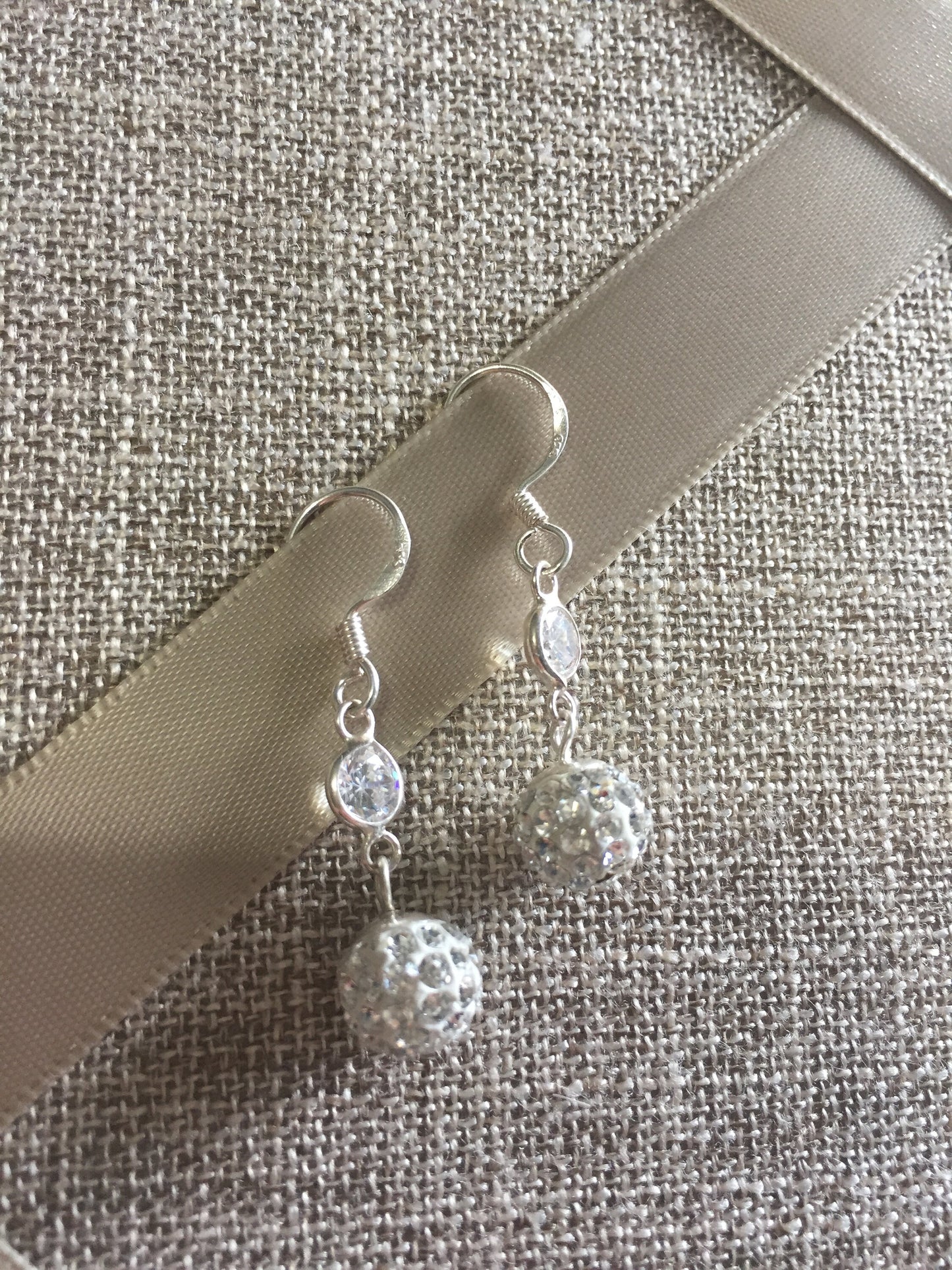 Fireball Dangle White Crystal Earrings